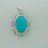 Brass Pendant with Faceted Oval Dyed Jade Teal & Cubic Zirconia 
